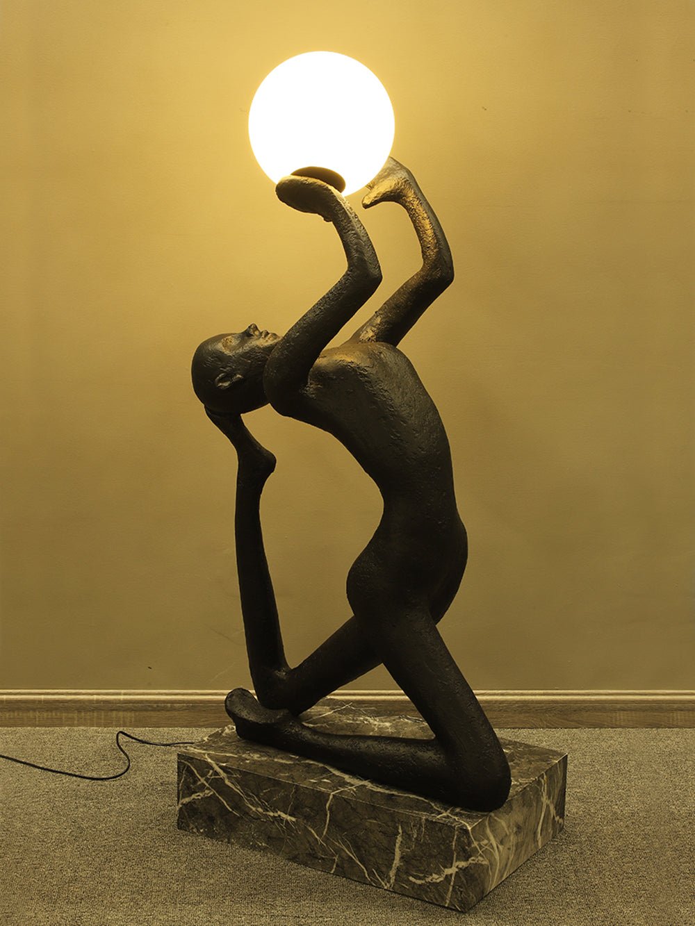 Evvinyra Contorted Black Metal Floor Lamp - Blowlighting