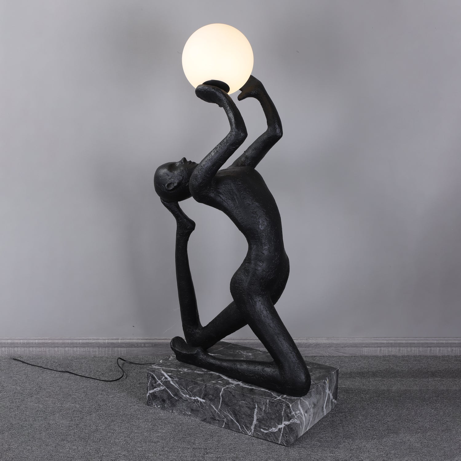 Evvinyra Contorted Black Metal Floor Lamp - Blowlighting