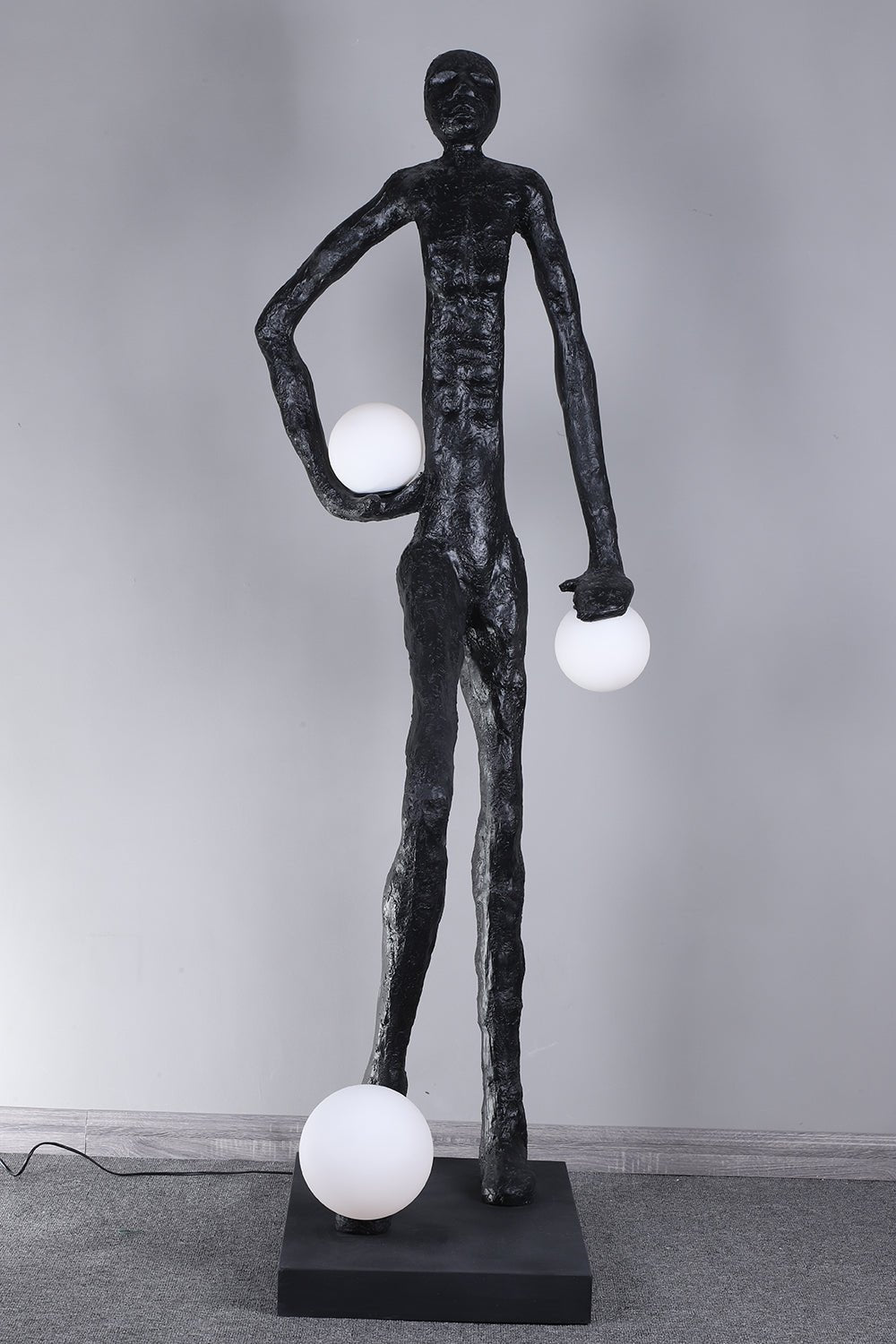 Kaelthos Textured Black Metal Floor Lamp - Blowlighting