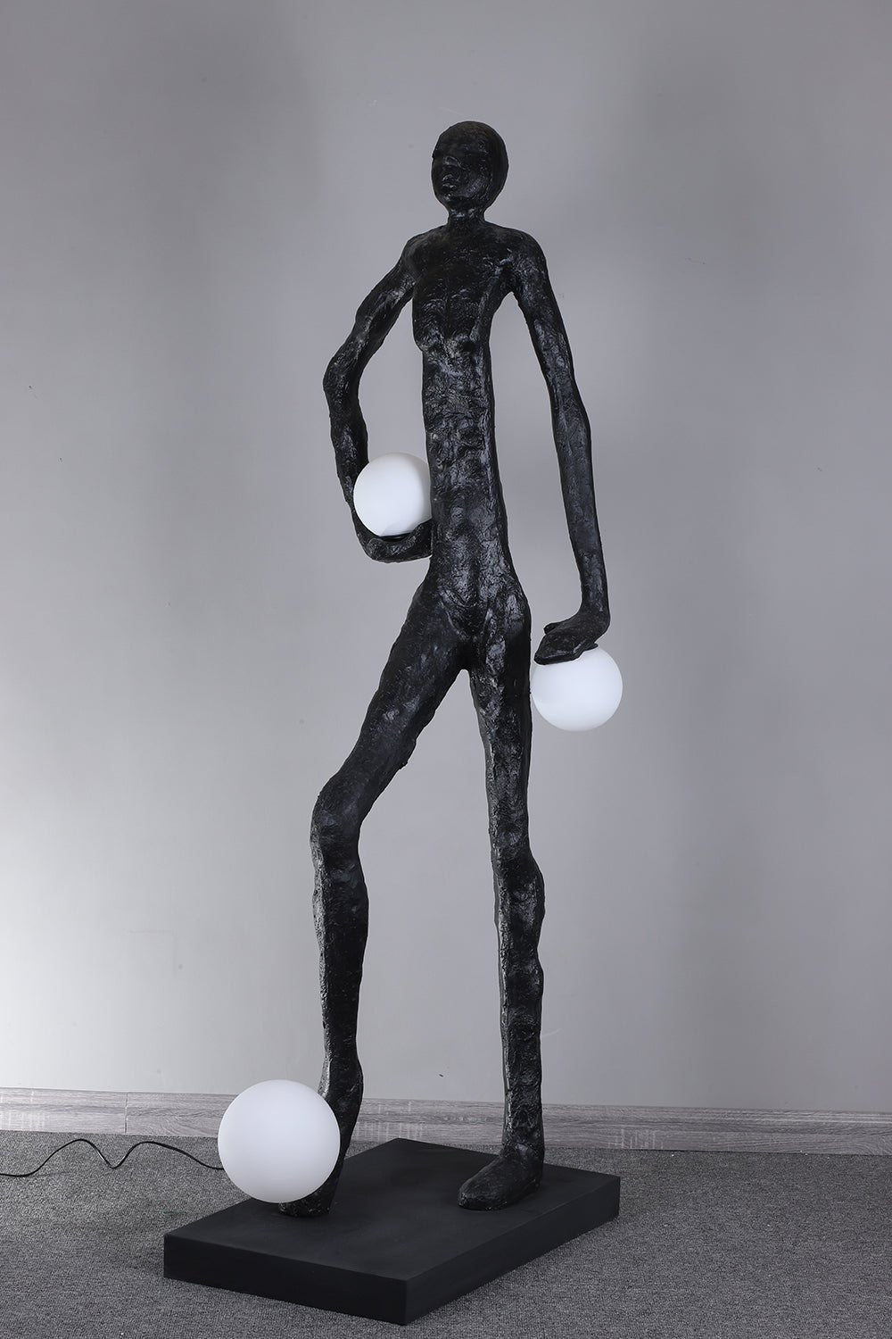 Kaelthos Textured Black Metal Floor Lamp - Blowlighting