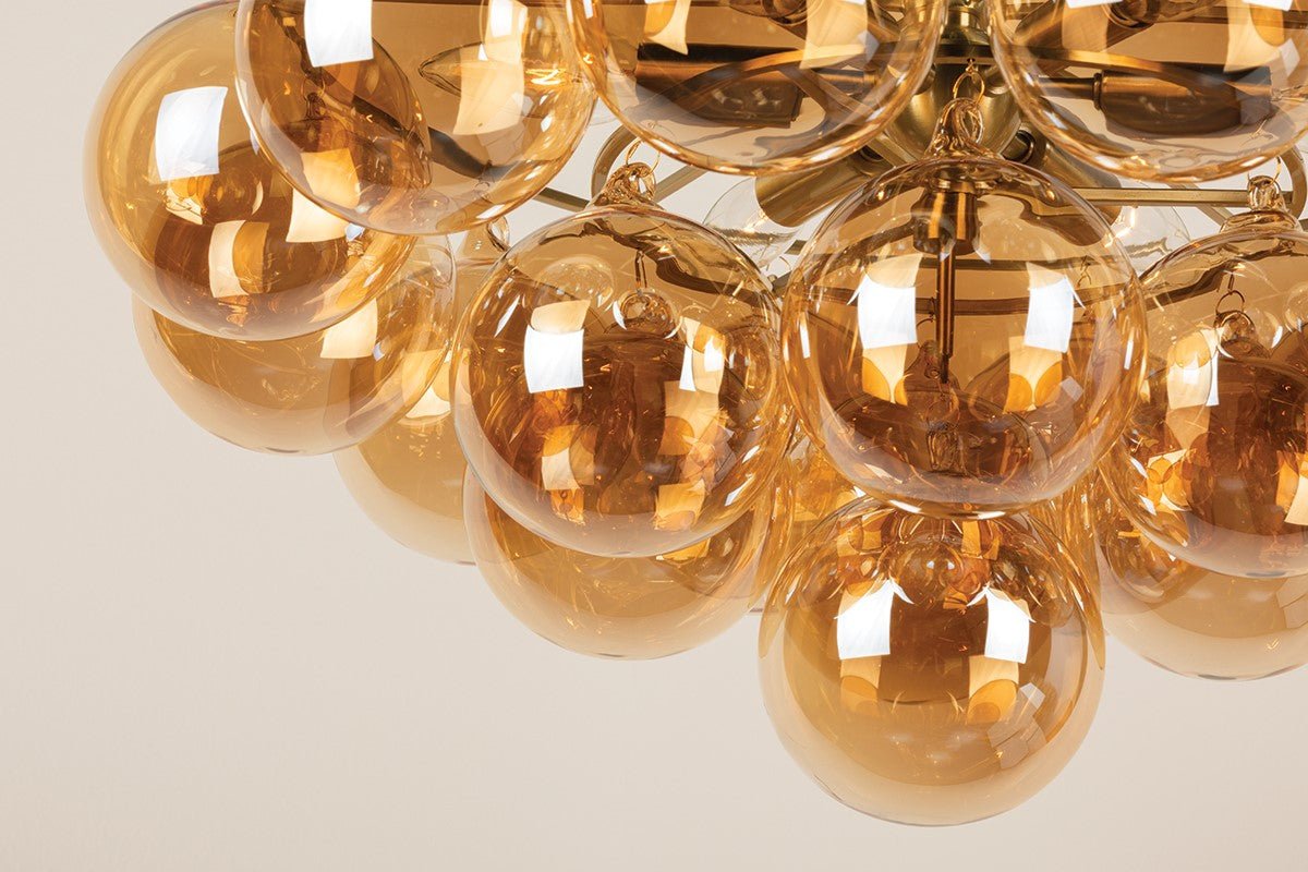 Aurora Chandelier Clear Glass Globe Aged Brass Elegant