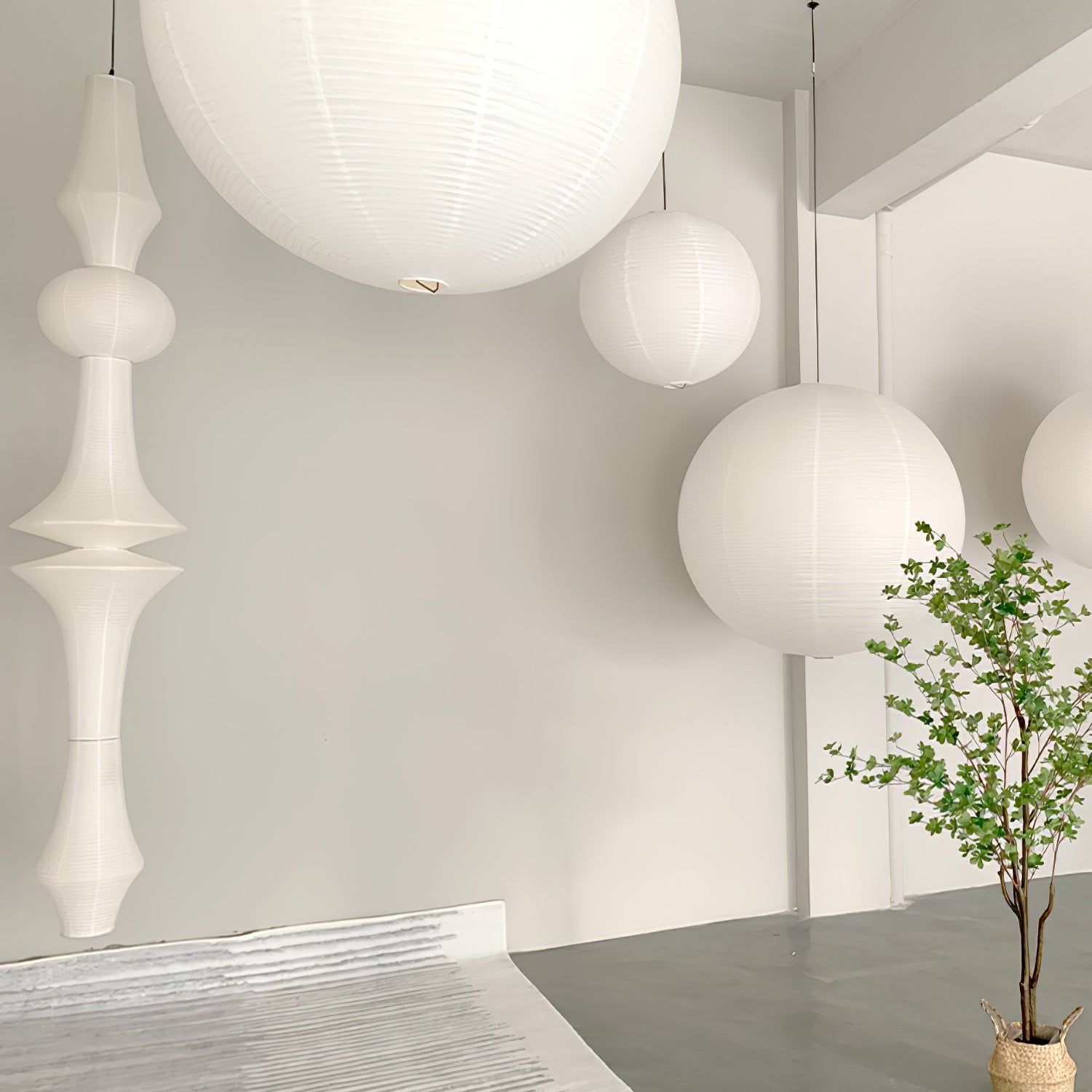 Ritta Sculptural Paper Vertical Pendant Light